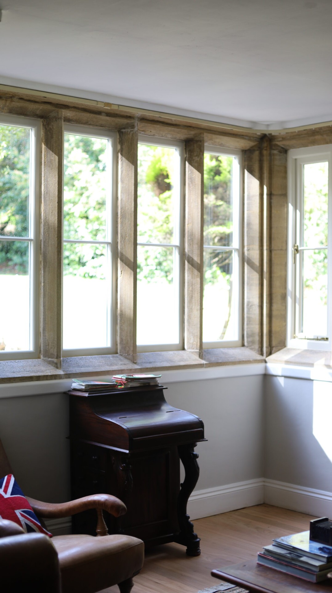 Restored stone mullion bay window
